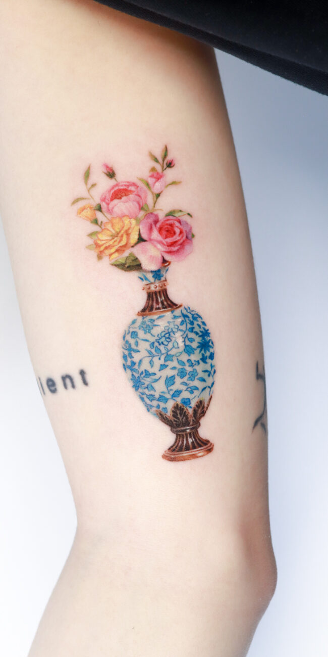 Flower Tattoo by Realism Tattoo Studio