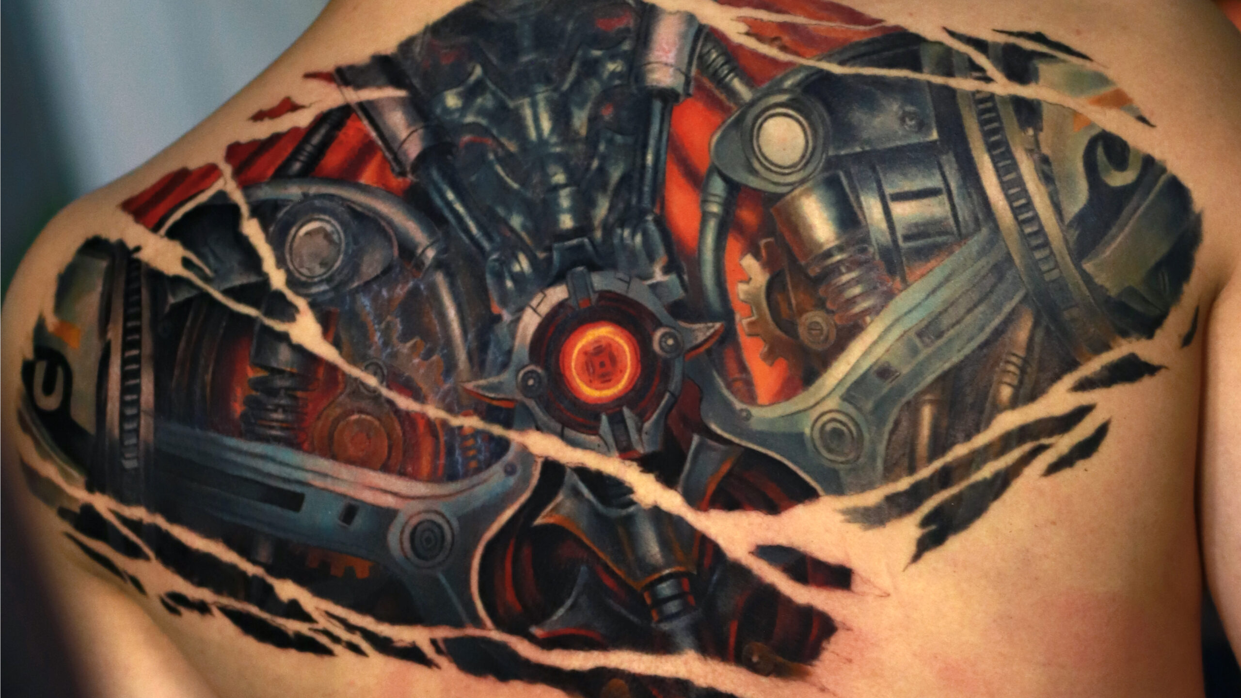 Large-scale biomechanical full back tattoo composition